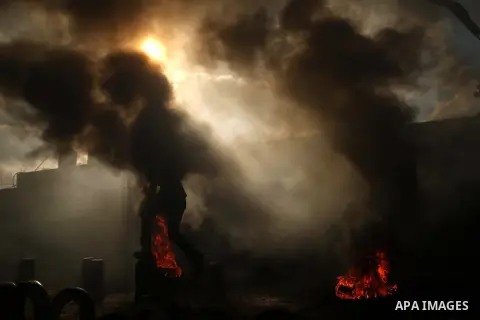 Palestinian youths take part in a military-style exercise at a summer camp organized by the Hamas movement in Gaza City June 12, 2014. Hamas stages dozens of military-style summer camps for young Palestinians in the Gaza...