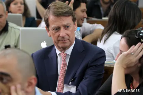 The British ambassador James Watt, attends the sentencing session at a courtroom in Cairo, Egypt, 23 June 2014. Three Al Jazeera journalists were jailed for seven years in Egypt on Monday after a court convicted them of...