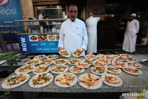 Palestinians prepare chickpeas known as hummus for breakfasting during the holy fasting month of Ramadan in Gaza city, on July 04, 2014. Muslims around the world refrain from eating, drinking and sexual intercourse from...