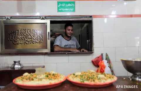 Palestinians prepare chickpeas known as hummus for breakfasting during the holy fasting month of Ramadan in Gaza city, on July 04, 2014. Muslims around the world refrain from eating, drinking and sexual intercourse from...