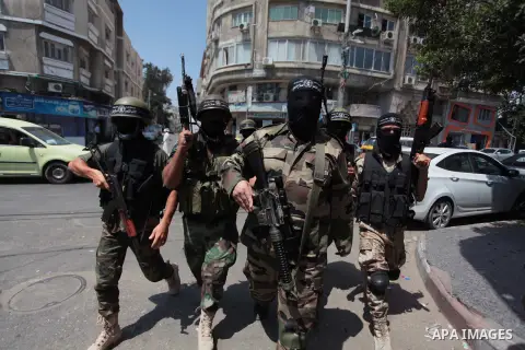 Palestinian militants of the Nasser Salah al-Din Brigades the military wing of the Popular Resistance Committees take part in a press conferenceon on cross-border escalation between Palestinians and Israel, in Gaza City...