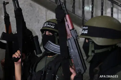 Palestinian militants of the Nasser Salah al-Din Brigades the military wing of the Popular Resistance Committees take part in a press conferenceon on cross-border escalation between Palestinians and Israel, in Gaza City...