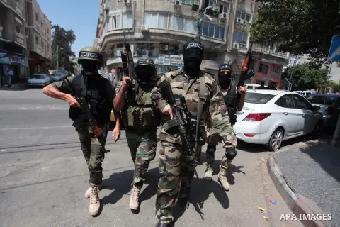 Palestinian militants of the Nasser Salah al-Din Brigades the military wing of the Popular Resistance Committees take part in a press conferenceon on cross-border escalation between Palestinians and Israel, in Gaza City...