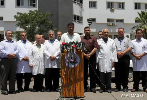 Undersecretary of the Palestinian ministry of Health, Yousef Abu Rish speaks during a press conference, in Gaza city on July 6, 2014. Photo by Mohammed Asad