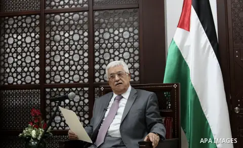 Palestinian president Mahmud Abbas speaks during a meeting with Robert Serry, the United Nations Special Coordinator for the Middle East Peace Process, at his office in the West Bank city of Ramallah on July 6, 2014. Abb...