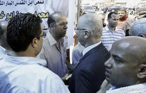 Palestinian Prime Minister Rami Hamdallah visits the mourning tent of Mohammed Abu Khder in Shuafat on July 06, 2014. Abu Khder, a Palestinian teenager was reportedly kidnapped and killed, triggering violent clashes in e...