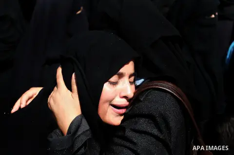 A relative of Palestinian Hamas militant Abdulrahman al-Zameli mourns during his funeral in Rafah in the southern Gaza Strip July 7, 2014. Israeli air strikes killed six Hamas militants, one of them al-Zameli, in the Gaz...
