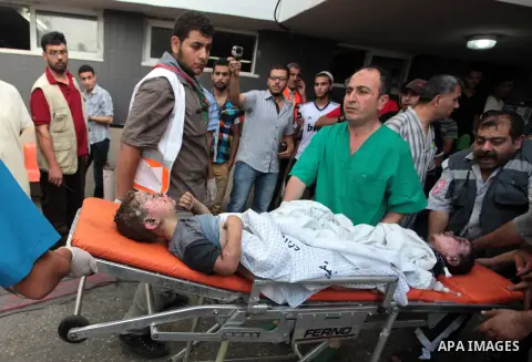 Injured Palestinian children arrive at al-Shifa hospital in Gaza City on July 20, 2014. Israel's army said it was expanding its ground offensive against the Gaza Strip, as the bloodiest conflict since 2009 entered its 13...
