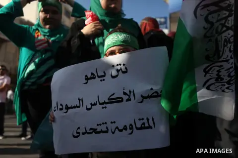Palestinian protesters shout slogans and hold signs during a demonstration against Israel's military action and violence in the Gaza strip, in West Bank City of Ramallah July 20, 2014. Israeli strikes on Gaza on Sunday,...