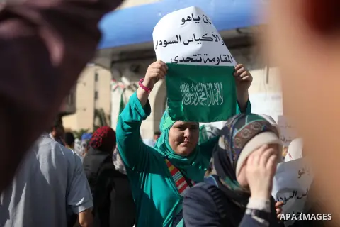 Palestinian protesters shout slogans and hold signs during a demonstration against Israel's military action and violence in the Gaza strip, in West Bank City of Ramallah July 20, 2014. Israeli strikes on Gaza on Sunday,...