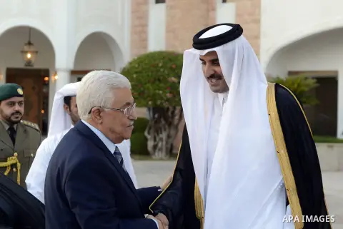 Palestinian President, Mahmoud Abbas (Abu Mazen) meets with Qatar Emir, Tamim Bin Hamad Al Thani, in Doha, Qatar, on July 20, 2014. Photo by Thaer Ganaim