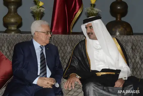 Palestinian President, Mahmoud Abbas (Abu Mazen) meets with Qatar Emir, Tamim Bin Hamad Al Thani, in Doha, Qatar, on July 20, 2014. Photo by Thaer Ganaim