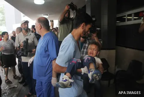 A Palestinian boy, who medics said was wounded by Israeli shelling, receives treatment at al-Shifa hospital in Gaza City July 21, 2014. According to figures released by emergency services' spokesman Ashraf al-Qudra, some...