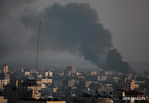 Smoke rises after an Israeli shelling at the Shijaiyah neighborhood in Gaza City, Gaza Strip, Monday, July 21, 2014. The top Hamas leader in the Gaza Strip signaled Monday that the Islamic militant group will not agree t...
