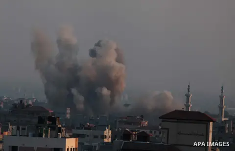 Smoke rises after an Israeli shelling at the Shijaiyah neighborhood in Gaza City, Gaza Strip, Monday, July 21, 2014. The top Hamas leader in the Gaza Strip signaled Monday that the Islamic militant group will not agree t...