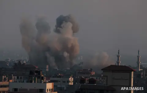 Smoke rises after an Israeli shelling at the Shijaiyah neighborhood in Gaza City, Gaza Strip, Monday, July 21, 2014. The top Hamas leader in the Gaza Strip signaled Monday that the Islamic militant group will not agree t...