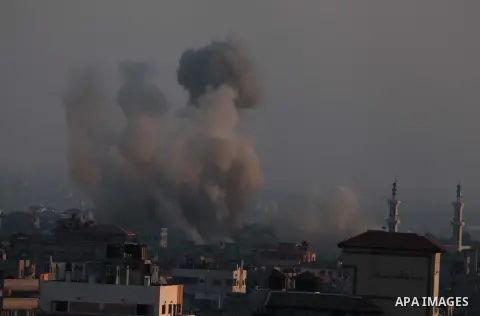 Smoke rises after an Israeli shelling at the Shijaiyah neighborhood in Gaza City, Gaza Strip, Monday, July 21, 2014. The top Hamas leader in the Gaza Strip signaled Monday that the Islamic militant group will not agree t...