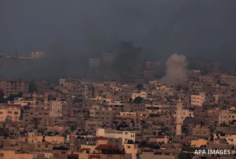 Smoke rises after an Israeli shelling at the Shijaiyah neighborhood in Gaza City, Gaza Strip, Monday, July 21, 2014. The top Hamas leader in the Gaza Strip signaled Monday that the Islamic militant group will not agree t...