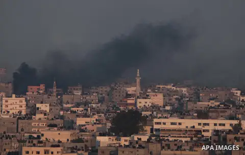 Smoke rises after an Israeli shelling at the Shijaiyah neighborhood in Gaza City, Gaza Strip, Monday, July 21, 2014. The top Hamas leader in the Gaza Strip signaled Monday that the Islamic militant group will not agree t...