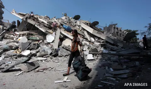 A Palestinian girl walks past the rubble of a residential building, which police said was destroyed in an Israeli air strike, in Gaza City July 22, 2014. Israel kept up its assaults in the Gaza Strip on Tuesday, killing...
