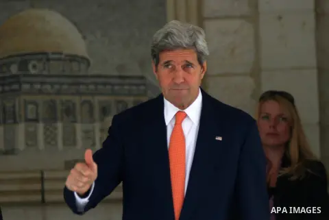 U.S. Secretary of State John Kerry arrives at a meeting with Palestinian President Mahmoud Abbas in the West Bank city of Ramallah, Wednesday, July 23, 2014. Kerry is meeting with U.N. Secretary-General Ban Ki-moon, Isra...