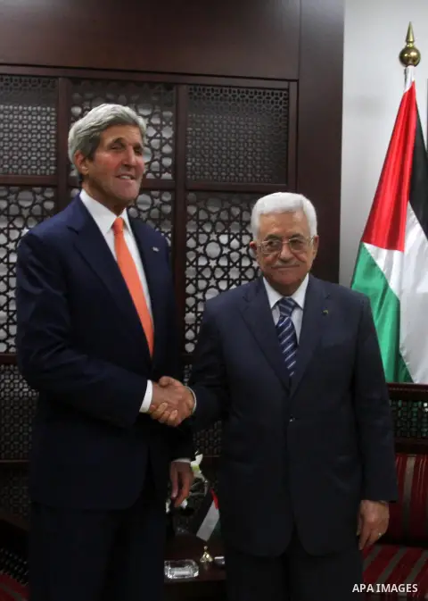 U.S. Secretary of State John Kerry (L) meets Palestinian President Mahmoud Abbas in the West Bank city of Ramallah July 23, 2014. Kerry is meeting with U.N. Secretary-General Ban Ki-moon, Israeli Prime Minister Benjamin...