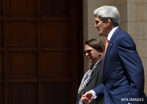 U.S. Secretary of State John Kerry arrives at a meeting with Palestinian President Mahmoud Abbas in the West Bank city of Ramallah, Wednesday, July 23, 2014. Kerry is meeting with U.N. Secretary-General Ban Ki-moon, Isra...