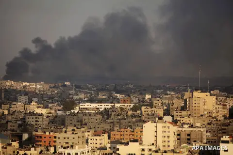 Smoke rises from buildings following an Israeli airstrike in eastern Gaze City neighbourhood of Shejaiya during a military operation on July 23, 2014. A series of strikes and shellings throughout Gaza brought the total n...