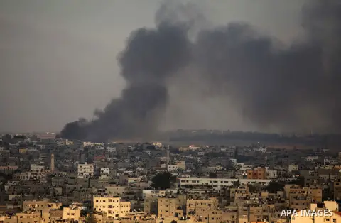 Smoke rises from buildings following an Israeli airstrike in eastern Gaze City neighbourhood of Shejaiya during a military operation on July 23, 2014. A series of strikes and shellings throughout Gaza brought the total n...