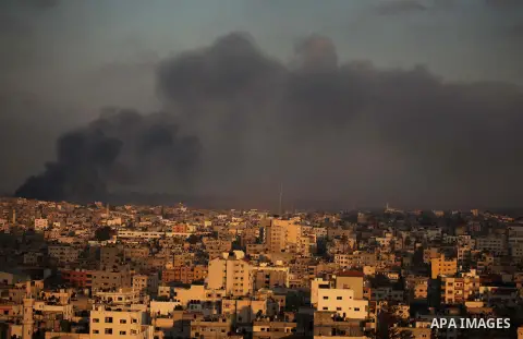 Smoke rises from buildings following an Israeli airstrike in eastern Gaze City neighbourhood of Shejaiya during a military operation on July 23, 2014. A series of strikes and shellings throughout Gaza brought the total n...