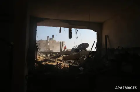Palestinians search for victims under the rubble of a house which witnesses said was destroyed by an Israeli air strike during an Israeli ground offensive east of Khan Younis in the southern Gaza Strip July 24, 2014. Isr...