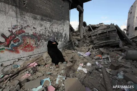 Palestinians inspect the rubble of destroyed houses in the Shejaia neighbourhood, which witnesses said was heavily hit by Israeli shelling and air strikes during an Israeli offensive, in Gaza City July 26, 2014. A 12-hou...