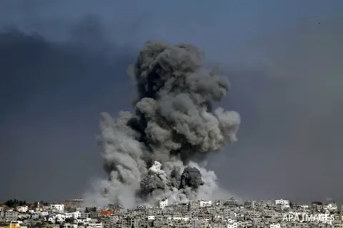 Smoke from the explosion of an Israeli strike rise over Gaza City, Tuesday, July 29, 2014. Israel escalated its military campaign against Hamas on Tuesday, striking symbols of the group's control in Gaza and firing tank...