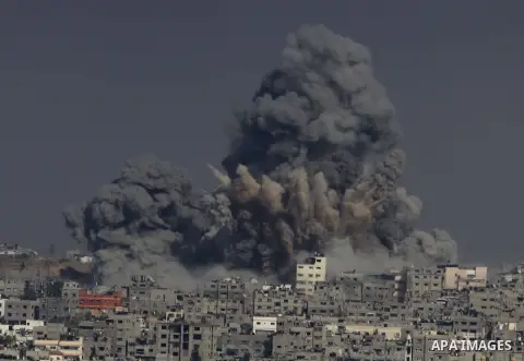 Smoke from the explosion of an Israeli strike rise over Gaza City, Tuesday, July 29, 2014. Israel escalated its military campaign against Hamas on Tuesday, striking symbols of the group's control in Gaza and firing tank...