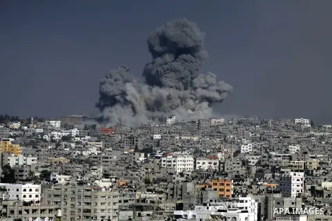 Smoke from the explosion of an Israeli strike rise over Gaza City, Tuesday, July 29, 2014. Israel escalated its military campaign against Hamas on Tuesday, striking symbols of the group's control in Gaza and firing tank...