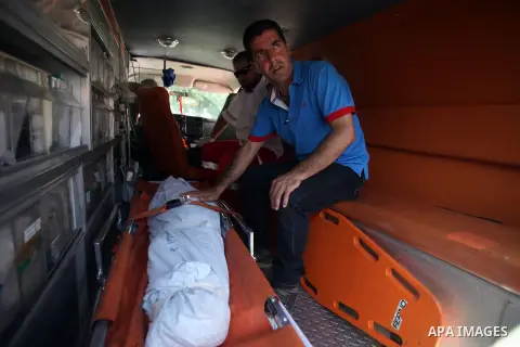Palestinians mourns two body of Zehir Al-Najar 7, and Ahmed Abu Baler 19, from the Gaza Strip, during thier funeral in East Jerusalem, on July 30, 2014 after they died from injuries sustained following an Israeli militar...