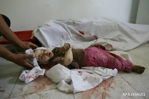 Palestinian relatives carry the body of one year old Rezeq Abu Taha, killed during attacks on the Gaza Strip, in Rafah, in the southern Gaza Strip on August 2, 2014. A fresh wave of violence killed dozens in Gaza after t...