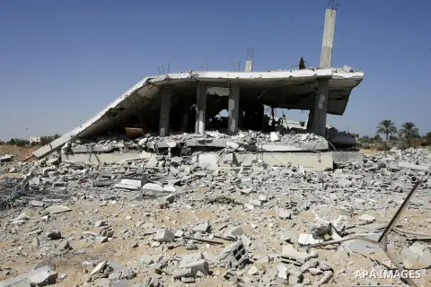 The rubble of a house, which witnesses said was badly damaged during the Israeli offensive, is seen in the east of Rafah in the southern Gaza Strip August 6, 2014. Israel pulled its last soldiers out of the Gaza Strip on...