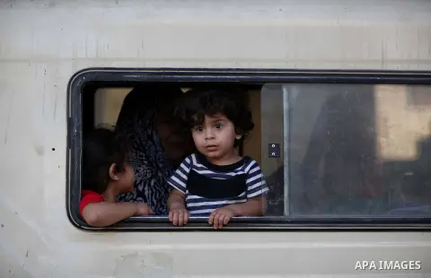 Palestinian families leave their homes in Gaza City's Shejaiya neighborhood in fear of Israeli attacks, after Palestinian factions in Gaza refused to extend the 72-hour ceasefire with Israel, on August 8, 2014. Militants...