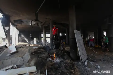 Palestinians inspect the rubble of a destroyed mosque following an Israeli airstrike in Gaza City, on August 9, 2014. Israel launched more than 20 aerial attacks in Gaza early on Saturday and militants fired several rock...