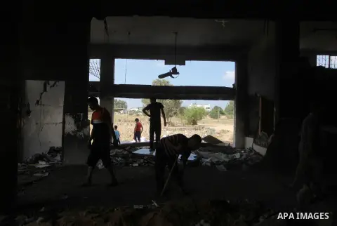 Palestinians inspect the rubble of a destroyed mosque following an Israeli airstrike in Gaza City, on August 9, 2014. Israel launched more than 20 aerial attacks in Gaza early on Saturday and militants fired several rock...