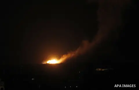 Smoke and fire billow following an Israeli air strike in Rafah in the southern of Gaza Strip on August 09, 2014. Israeli warplanes pounded targets in Gaza, a day after killing at least five Palestinians, and militants fi...