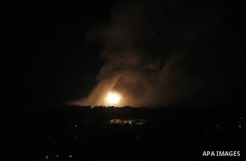 Smoke and fire billow following an Israeli air strike in Rafah in the southern of Gaza Strip on August 09, 2014. Israeli warplanes pounded targets in Gaza, a day after killing at least five Palestinians, and militants fi...
