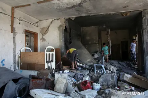 Palestinian children inspect a damaged house was hit by an Israeli military strike in Gaza City on August 10, 2014. A senior Hamas official said there was a "weak" possibility that Gaza truce talks would succeed and that...