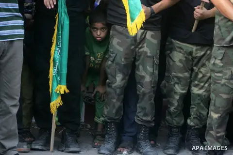 Palestinian Hamas supporters take part in a rally to support Palestinian negotiators in Cairo, Egypt, in Rafah in the southern Gaza Strip, August 17, 2014. Israeli Prime Minister Benjamin Netanyahu said on Sunday any dea...