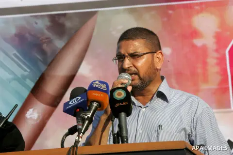 Palestinian Hamas supporters take part in a rally to support Palestinian negotiators in Cairo, Egypt, in Rafah in the southern Gaza Strip, August 17, 2014. Israeli Prime Minister Benjamin Netanyahu said on Sunday any dea...