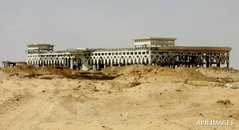 A general view taken on August 19, 2014, shows the destroyed and deserted terminals of the Gaza strips former international airport in the southern city of Rafah. Israel and the Palestinians have agreed to extend the cea...