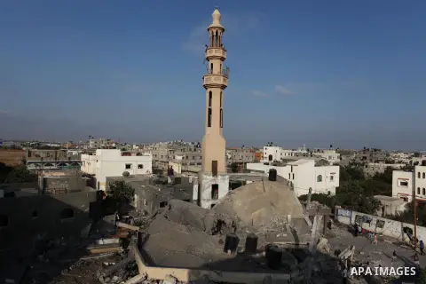 Palestinians inspect the remains of a mosque , which witnesses said was destroyed in an Israeli air strike, in Khan Younis in the southern Gaza strip August 23, 2014. Hamas-led gunmen in Gaza executed 18 Palestinians acc...
