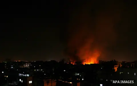 A ball of fire rises from a mall following an Israeli airstrike in Rafah in the southern Gaza strip on Aug. 23, 2014. Egypt is to invite Israeli and Palestinian delegations to return to Cairo to resume talks on a long-te...