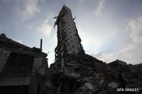 A general view of the remains of one of Gaza's tallest apartment towers, which witnesses said was hit by an Israeli air strike that destroyed much of it, in Gaza City August 26, 2014. Israeli air strikes launched before...